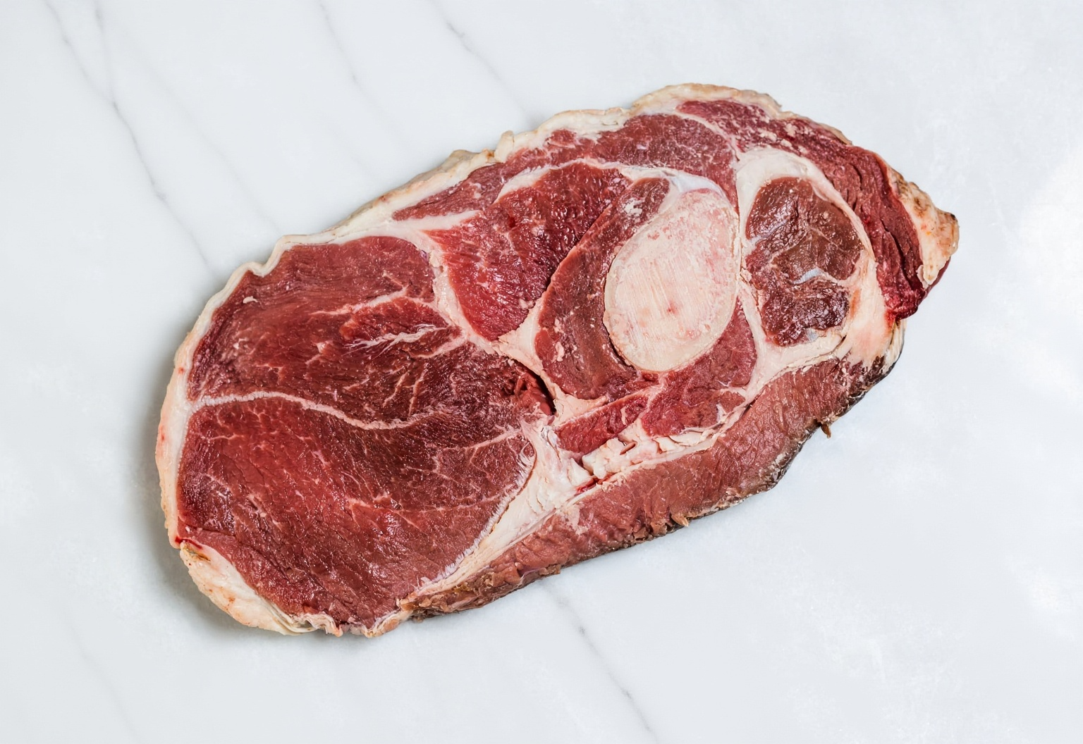 21-day dry-aged Sirloin Steak on white marble